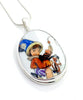 Child Riding Toy Horse Pendant on Silver Chain