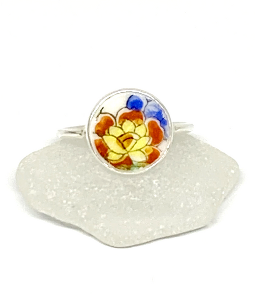Orange and Yellow Flower Vintage Pottery Round 