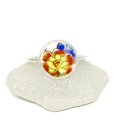 Orange and Yellow Flower Vintage Pottery Round 