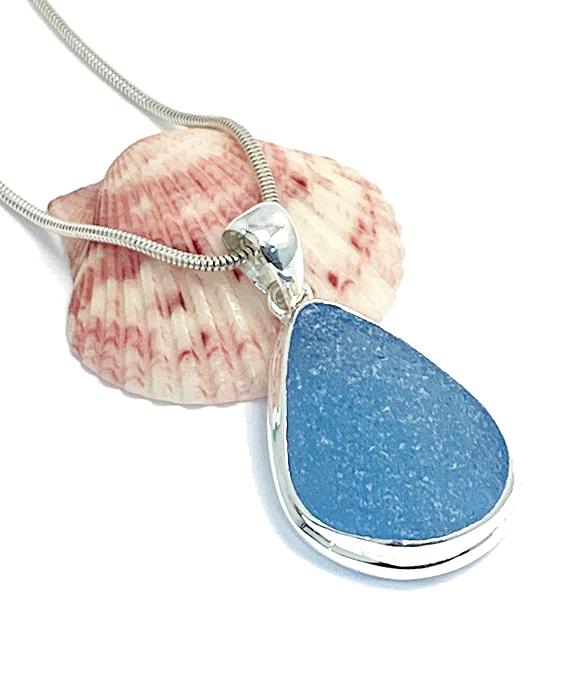 Lightly Textured Soft Blue Sea Glass Pendant on Silver Chain