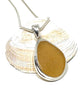 Golden Amber Sea Glass Pendant with Heavy Rim on Silver Chain