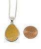 Golden Amber Sea Glass Pendant with Heavy Rim on Silver Chain