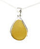 Golden Amber Sea Glass Pendant with Heavy Rim on Silver Chain