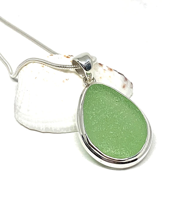 Soft Green Sea Glass Pendant with Heavy Rim on Silver Chain