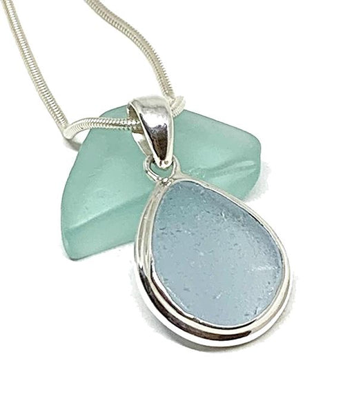 Soft Blue Sea Glass Pendant with Heavy Rim on Silver Chain